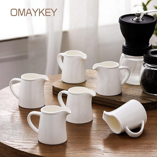 OMAYKEY 4.5 OZ 6-pcs Porcelain Creamer with Handle, Small Ceramic Cream Pitcher Sauce Pitcher Serving for Coffee Tea Milk - White