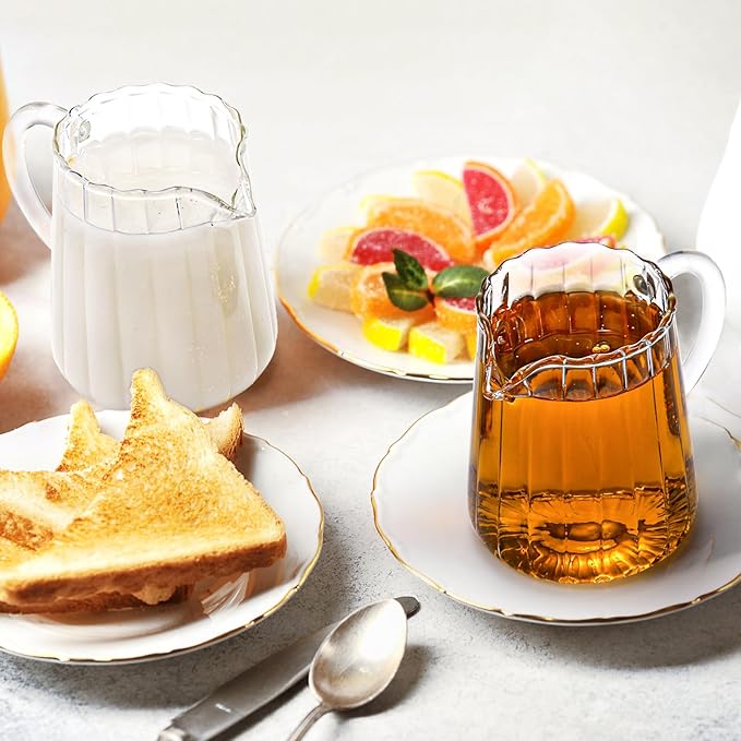 Yarlung 4 Pack Small Glass Pitcher, 8.5 Oz Clear Milk Creamer Pitcher with Handle, Creative Milk Frothing Coffee Pitcher for Table Serving, Salad Sauce
