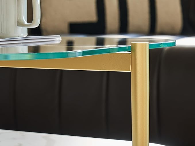 Shrine Oval Coffee Table, Mid-Century Modern Design, 2-Tier Structure, Clear Glass Top and White MDF Shelf, 41" D x 21" W x 17" H, Sleek Conical Metal Legs with Gold Finish