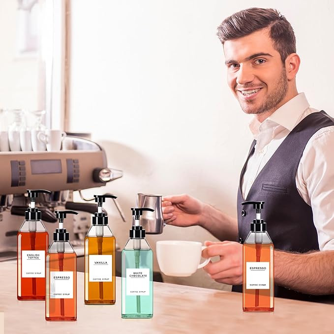 Nuogo 6 Pcs Coffee Syrup Dispenser Set 750ml, 500ml, 300ml, 150ml Pet Black Syrup Bottles with Pump Dispenser 27 Labels for Coffee Bar Kitchen Accessories Portable Travel(25.4 oz,Prismatic)