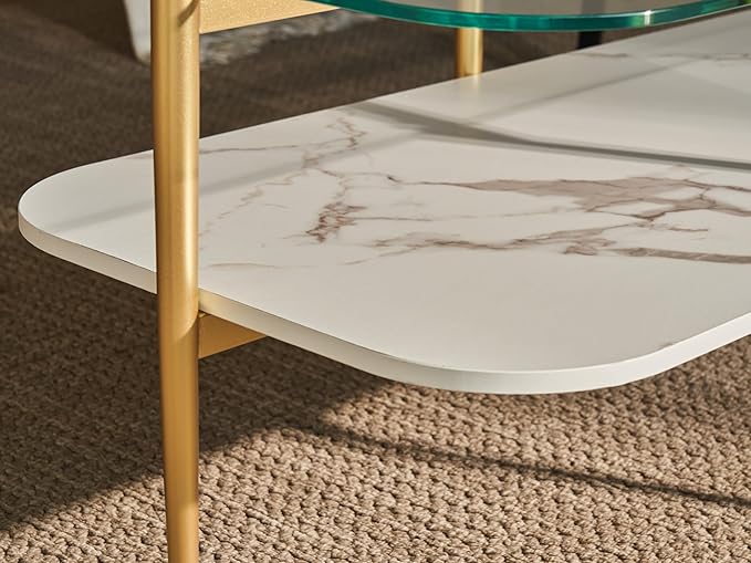 Shrine Oval Coffee Table, Mid-Century Modern Design, 2-Tier Structure, Clear Glass Top and White MDF Shelf, 41" D x 21" W x 17" H, Sleek Conical Metal Legs with Gold Finish