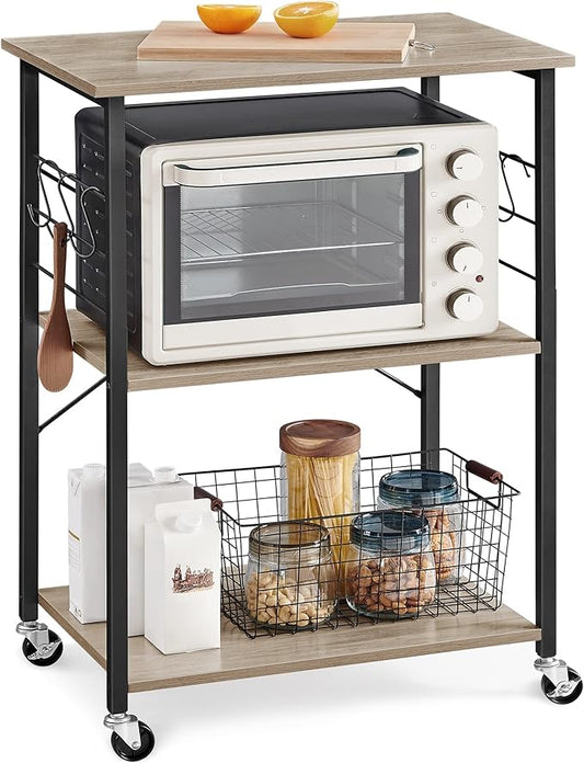 VASAGLE Kitchen Shelf on Wheels, 23.6 Inches Serving Cart with 3 Shelves, Kitchen Cart, Microwave Shelf, for Mini Oven, Toaster, with 6 Hooks, Industrial Style, Heather Greige and Ink Black UKKS060B02