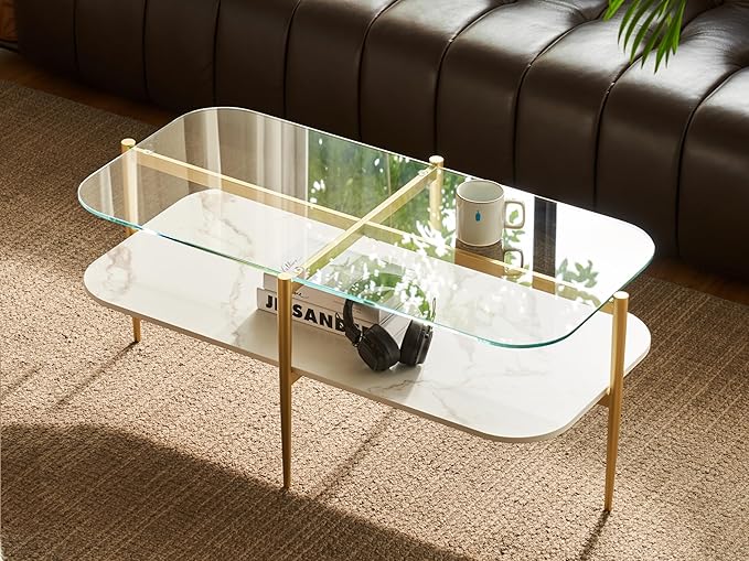 Shrine Oval Coffee Table, Mid-Century Modern Design, 2-Tier Structure, Clear Glass Top and White MDF Shelf, 41" D x 21" W x 17" H, Sleek Conical Metal Legs with Gold Finish